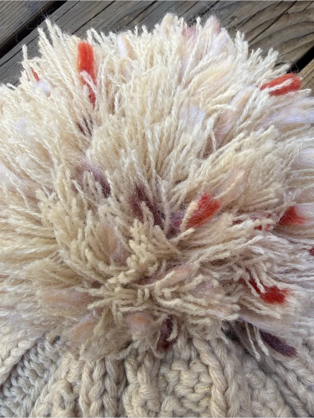 Cozy Cream Knit Pom Beanie with Subtle Color Accents Cara New York